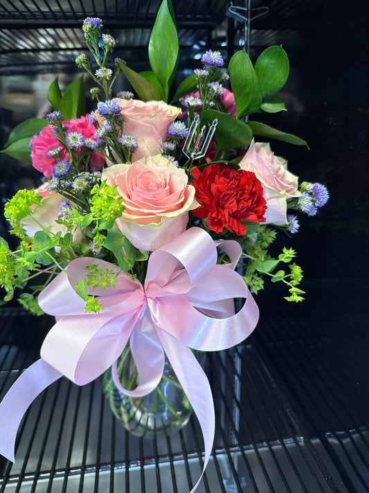 Fresh floral in tall vase $50.99